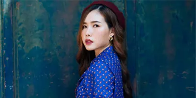 Asian-Woman-Blue-Background
