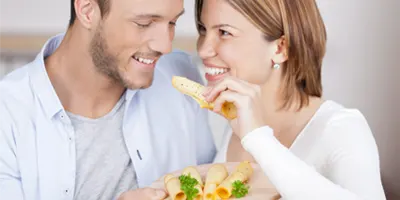 woman-feeds-cheese-to-man