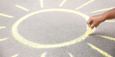 sidewalk-chalk-kid-drawing-sun-Xfast-Pigments