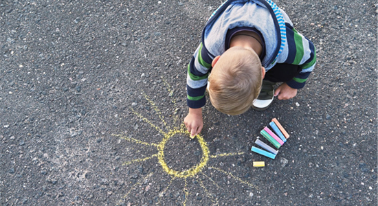 Kid-Drawing-Sidewalk-Chalk