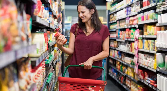 shopper-holds-packaging-grocery-store