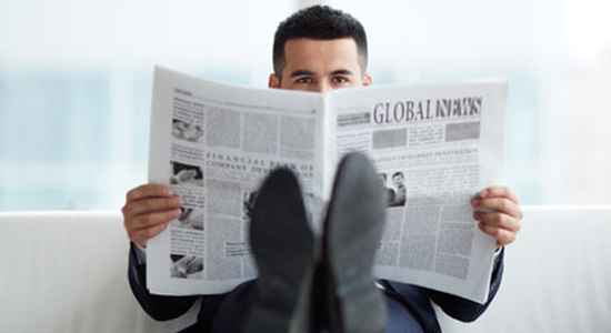 man-reading-newspaper