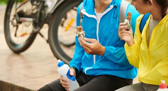 Eating-granola-bars-during-bike-ride