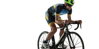 man-rides-bike-wearing-digitally-printed-bicycling-clothing