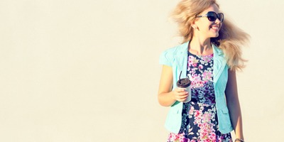 woman-wears-digitally-printed-flower-dress-holding-coffee