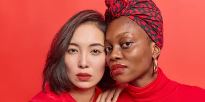 two-women-wearing-red-clothes-red-lipstick