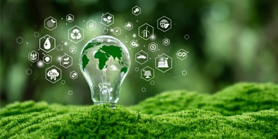 light-bulb-planted-in-green-ground-sustainability-icons-surround-it