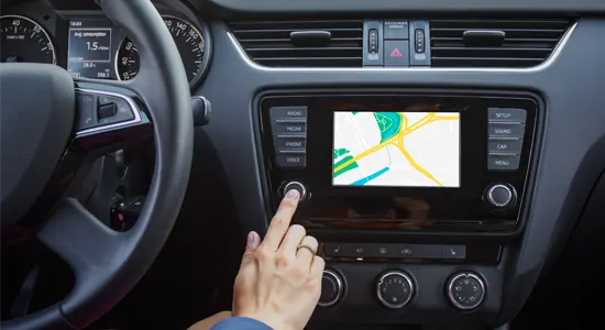 finger-touches-touchscreen-in-car